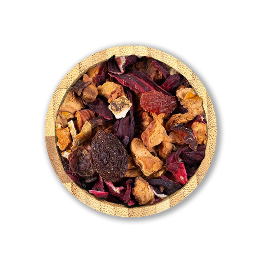 Christmas Cheer Tea Blend by Holy Tea, a festive organic blend of apple, hibiscus, cinnamon, and holiday spices.