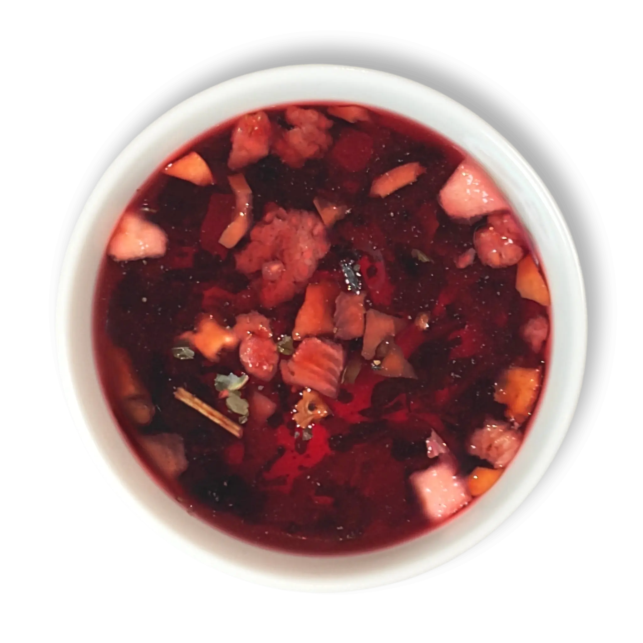 Vernal Muse fruit tea by Holy Tea brewed hot, showcasing deep ruby color with visible berries and fruit pieces