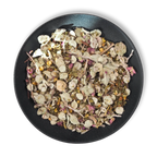 Aether of Crete organic herbal tea by Holy Tea Amsterdam – loose leaf blend with Cretan dittany, sage and citrus peel in kraft pouch with brewed infusion and dry leaves.