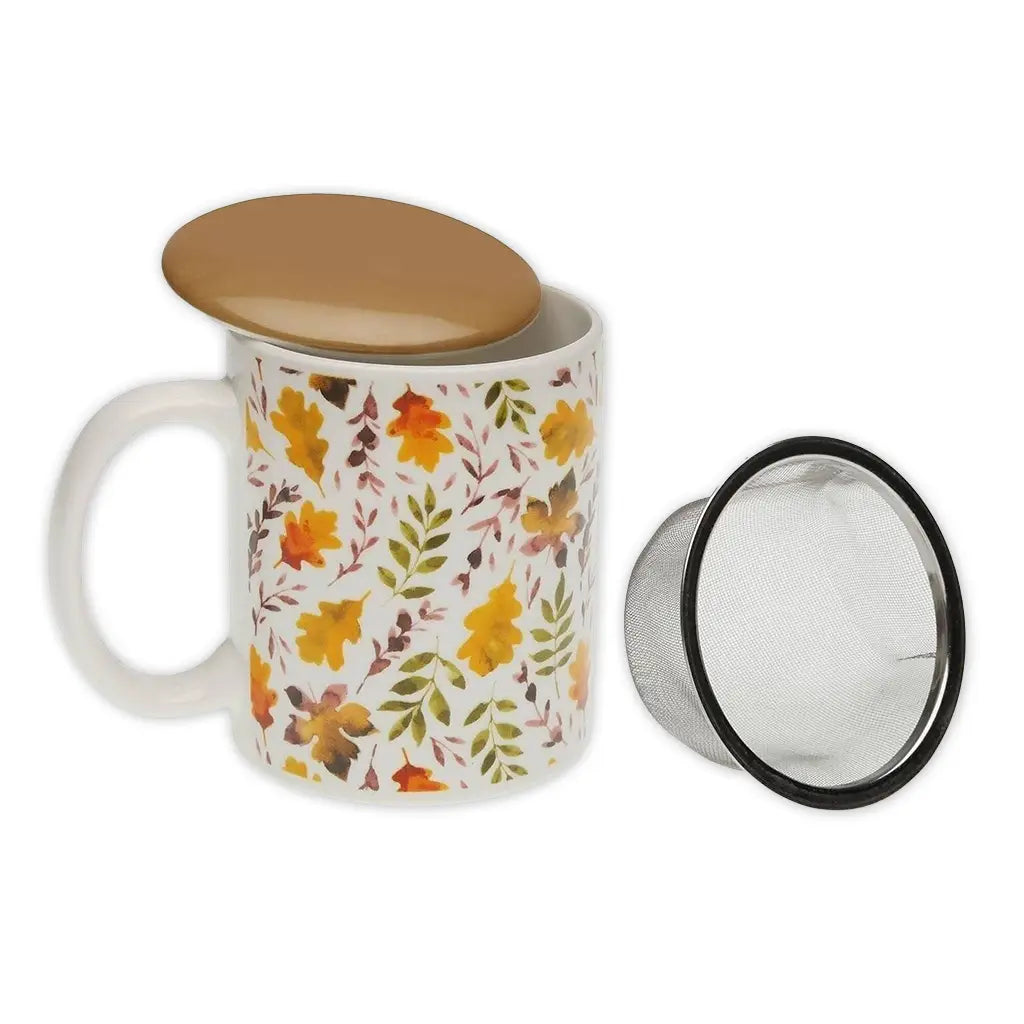 Autumn-themed stoneware tea cup with stainless steel infuser and lid, featuring colorful fall leaves pattern from Holy Tea.