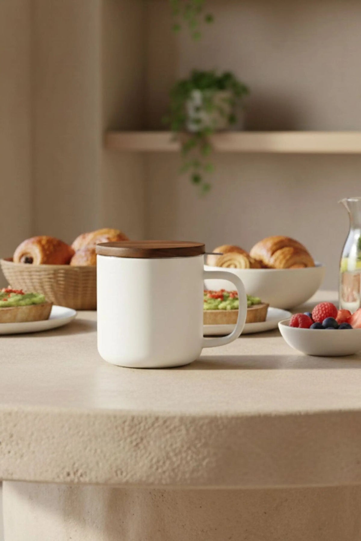 Juliet White 300 ml tea mug with acacia lid on a table with loose-leaf tea